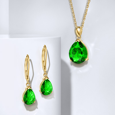 Helenite necklace and earrings set in gold